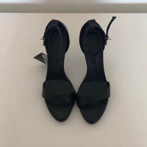 strapped black heels